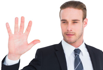 Cheerful businessman with hand raised