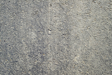 Background texture of gray asphalt. Closeup road surface. Gray road for background or texture