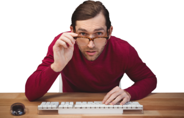 Surprised creative businessman working at desk