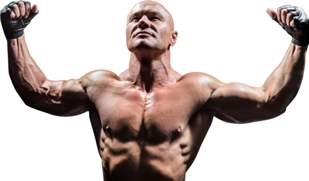 Muscular fighter with arms raised