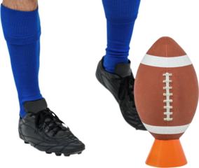 American football player about to kick ball
