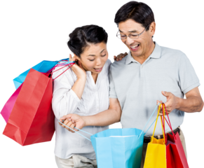Older asian couple with shopping bags