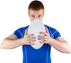 Rugby player holding rugby ball