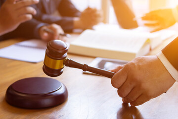 wooden judge gavel on table as symbol of justice for use in legal cases judicial system and civil...