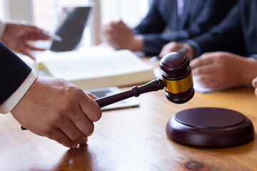 wooden judge gavel on table as symbol of justice for use in legal cases judicial system and civil rights and social justice concept with judge. concept of legislation to judge lawsuits with justice.