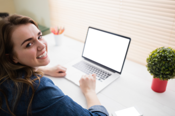 Portrait of businesswoman using her laptop
