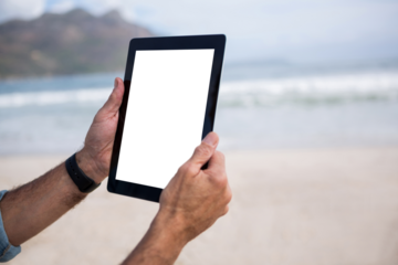 Cropped image of man using tablet