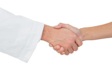 Extreme closeup of a doctor and patient shaking hands