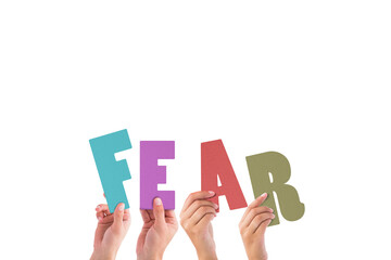 Cropped hands holding colorful word fear