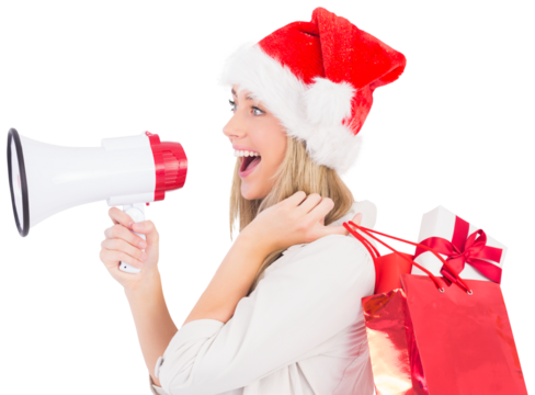 Festive blonde holding megaphone and bags