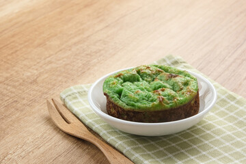 Kue Lumpur Bakar or Mud Cake, Indonesian traditional snack made from potatoes, flour, eggs and coconut milk
