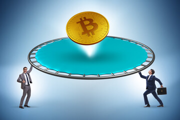 Monetary concept with cryptocurrency bouncing off the trampoline