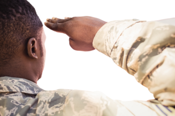 Cropped image of army soldier saluting