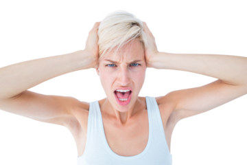 Angry woman screaming and holding her head 
