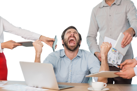 Colleagues standing by frustrated businessman at desk