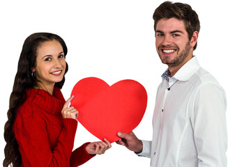 Smiling couple holding paper heart