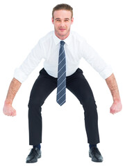 Businessman bending and lifting