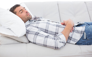 Man sleeping on sofa 