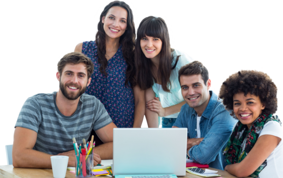 Happy creative business team gathered around a laptop