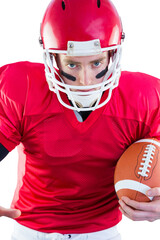 Portrait of focused american football player being ready to attack