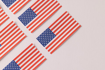 High angle view of rows of flags of united states of america with copy space on white background