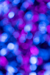 Close up of shiny multi coloured bokeh background with copy space