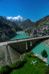 bridge on Indus river on Karakorum highway in chilas, beautiful green water river in the mountain valley, bridge on the  Indus river at Karakorum highway  