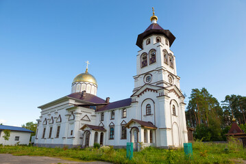 Fototapeta na wymiar Church of Alexander Nevsky (1903) on an August afternoon. Pudozh, Karelia. Russian Federation
