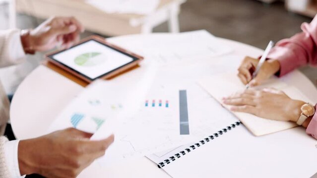 Business people, hands and analytics on table for data, information or corporate statistics at office desk. Hand of man and woman employee analyst in marketing with company graph or chart documents