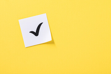 concept that expresses a checkmark using post-it © spacezerocom