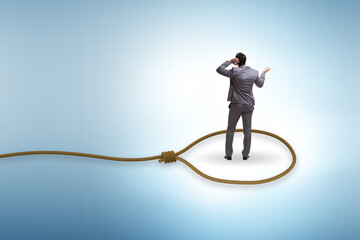 Business people trapped by a rope