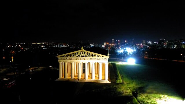 Aerial Forward Descending Shot Of Famous Art Museum In Illuminated City During Night - Nashville, Tennessee