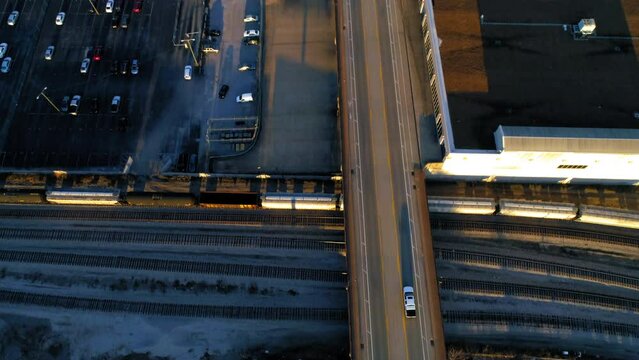 Aerial Top Forward Shot Of Vehicles Moving On Roads In City During Sunset - Nashville, Tennessee