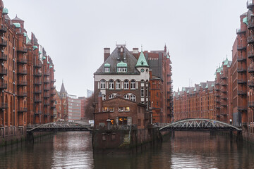Hamburg Speicherstadt. The Warehouse District (Speicherstadt) in Hamburg, Germany, at dusk. Old town on the water canals. HafenCity in Hamburg, Germany.