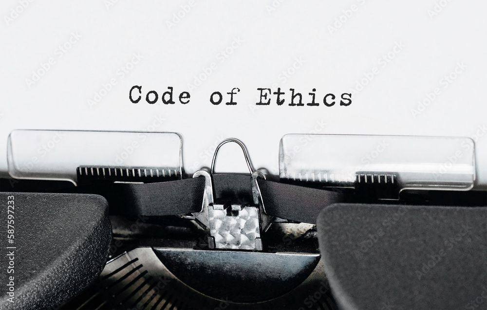 Poster text code of ethics typed on retro typewriter