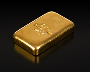 Cast gold bar, front view, over black. Stamped bullion bar of 250 gram or 8.04 troy oz refined...