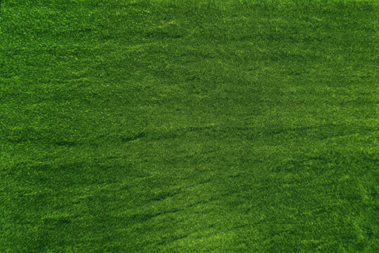 Dense green grass texture, high resolution. Perfect lawn, top view. Natural background of fresh green grass. Easter background concept. Springtime nature pattern. Copy space. Generative AI