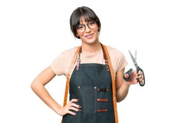 Young caucasian seamstress over isolated on chroma key background posing with arms at hip and smiling