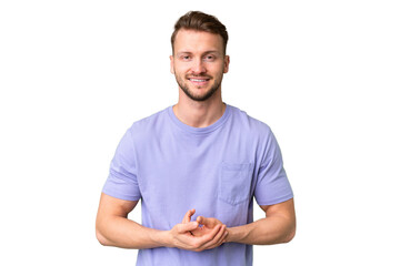 Young handsome caucasian man over isolated chroma key background laughing