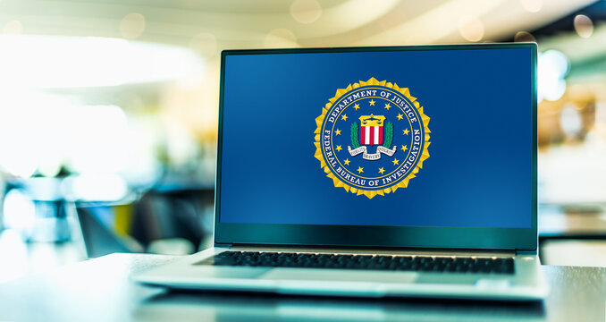 Laptop displaying logo of The Federal Bureau of Investigation