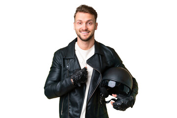 Young caucasian man with a motorcycle helmet over isolated chroma key background with surprise facial expression
