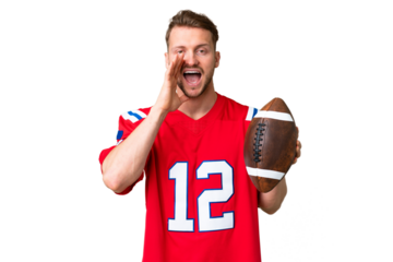 Young caucasian man playing rugby over isolated chroma key background shouting with mouth wide open