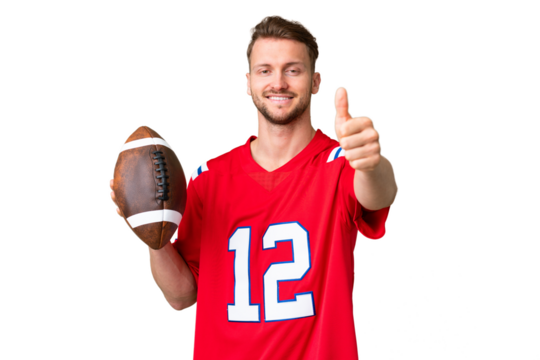 Young caucasian man playing rugby over isolated chroma key background with thumbs up because something good has happened