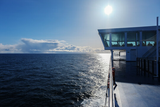 Fototapeta Scenic panoramic seascape view of Ocean and clouds on blue sky on sunny day at sea seen from outdoor deck of luxury cruiseship cruise ship liner