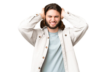 Young handsome man over isolated chroma key background frustrated and covering ears