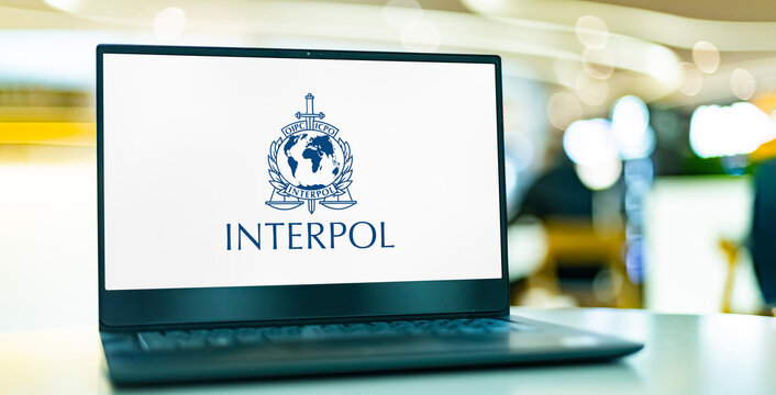 Laptop computer displaying logo of Interpol