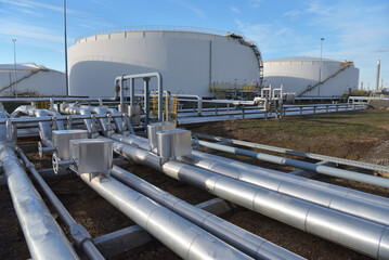 pipelines and buildings of a refinery - industrial plant for fuel production