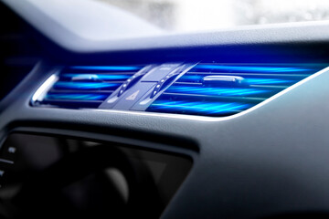 Modern car dashboard with air currents from vents. Car air conditioning. Air filtration. Cabin...
