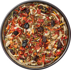 Bowl of spice mix for cooking oriental asian dishes - plov, curry and others. Flakes of parsley, celery roots, tomatoes, red hot pepper, paprika, onion, barberry berries, cumin, saffron seasoning.