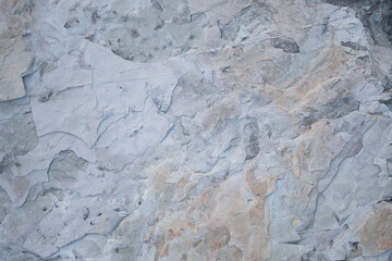 Abstract gray rocky background, stone pattern with cracks